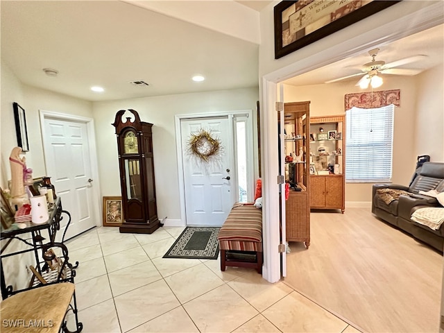 entrance foyer with light hardwood / wood-style floors and ceiling fan