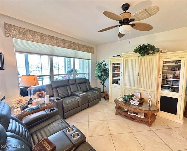 living room with light tile patterned floors and ceiling fan