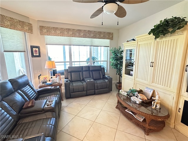 tiled living room featuring ceiling fan