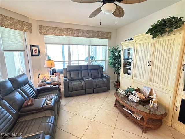 living room featuring light tile patterned floors and a ceiling fan