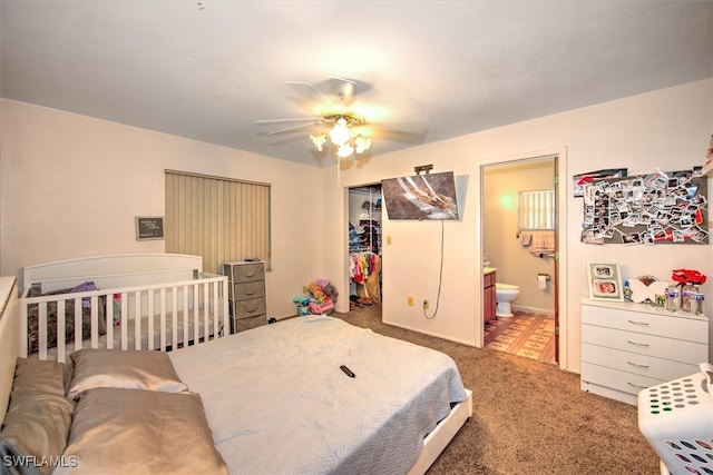 bedroom with carpet flooring, a closet, ceiling fan, and ensuite bathroom