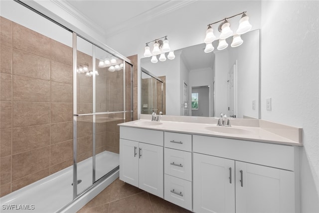 bathroom featuring tile patterned flooring, walk in shower, ornamental molding, and vanity