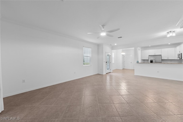 unfurnished living room featuring ornamental molding, light tile patterned floors, and ceiling fan