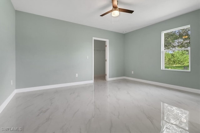 empty room featuring ceiling fan