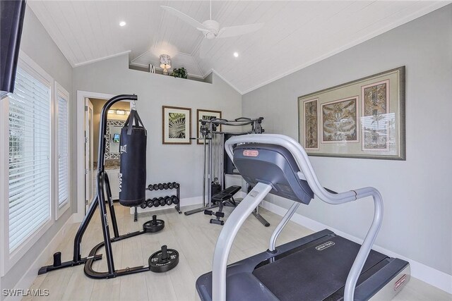 exercise area with ceiling fan, hardwood / wood-style flooring, lofted ceiling, and ornamental molding