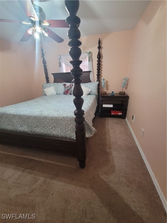 bedroom with ceiling fan and carpet flooring