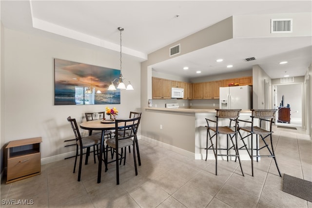 view of tiled dining space