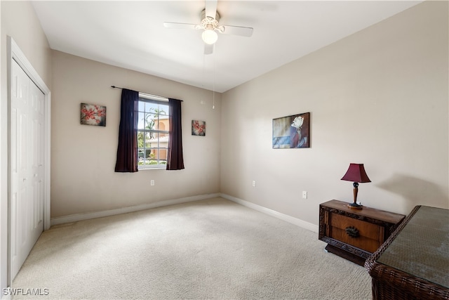 bedroom featuring a closet, carpet floors, and ceiling fan