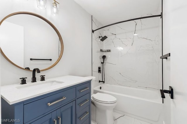 full bathroom featuring vanity, tiled shower / bath combo, and toilet