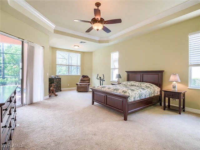 bedroom featuring ornamental molding, access to exterior, ceiling fan, a raised ceiling, and light carpet