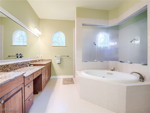 bathroom featuring vanity, tile patterned floors, and independent shower and bath