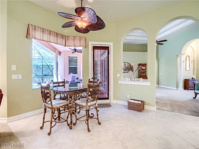 dining area with ceiling fan