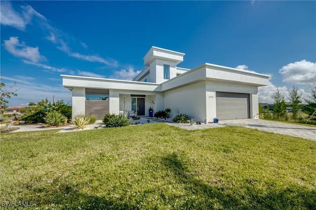 contemporary house with an attached garage, driveway, a front yard, and stucco siding