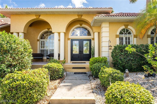 view of exterior entry with french doors