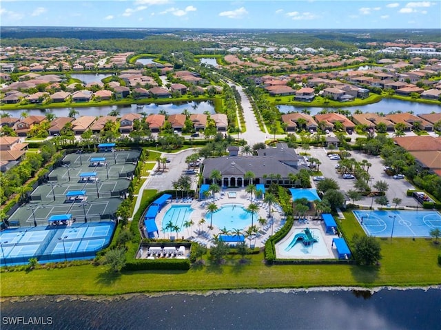 bird's eye view with a water view