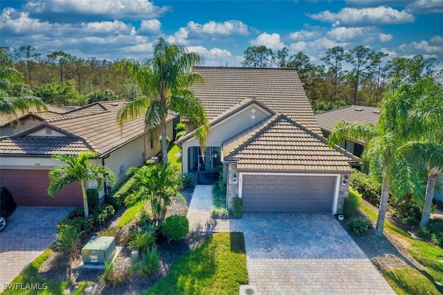 view of front of property with a garage