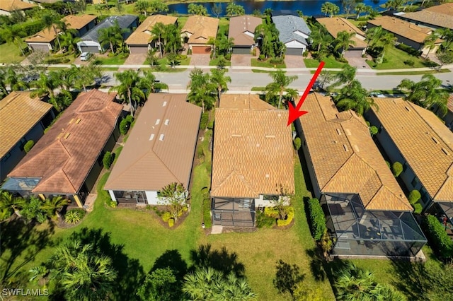10911 Glenhurst St, Fort Myers, FL 33913 - aerial perspective of suburban area with a nearby body of water