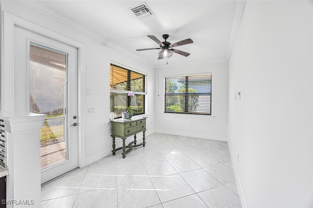 entryway featuring crown molding, ceiling fan, and light tile patterned floors