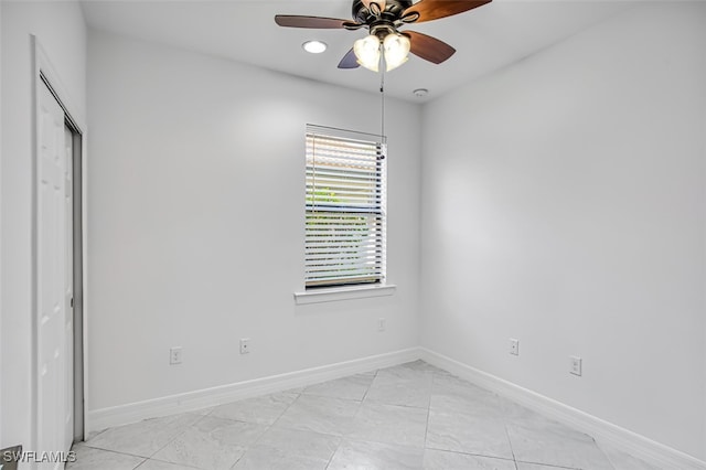 unfurnished bedroom featuring ceiling fan