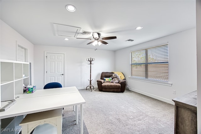 carpeted office with ceiling fan