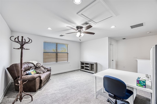 home office featuring light colored carpet and ceiling fan