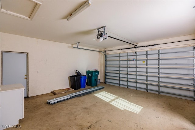 garage featuring a garage door opener