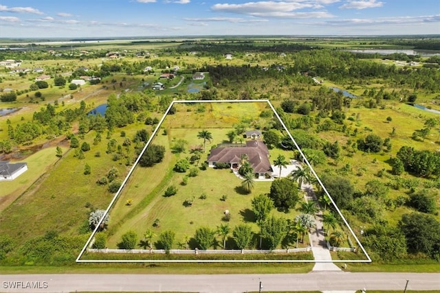 aerial view featuring a water view and a rural view