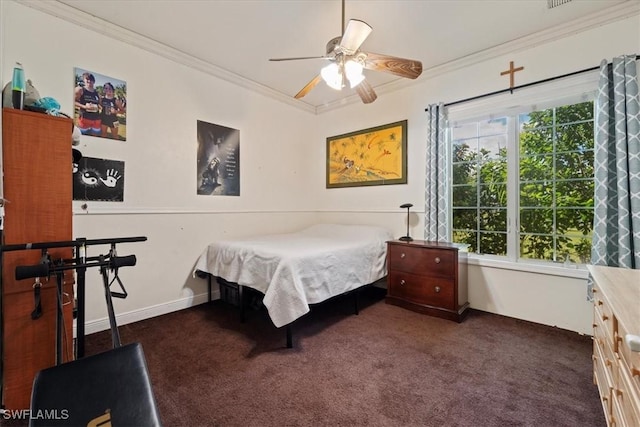 carpeted bedroom featuring multiple windows, crown molding, and ceiling fan