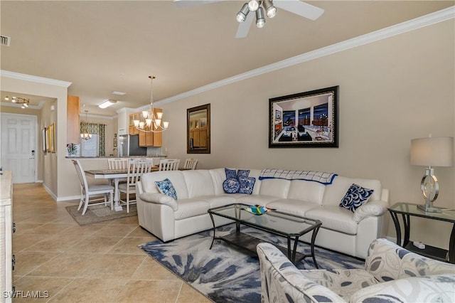 tiled living room with ceiling fan with notable chandelier and crown molding