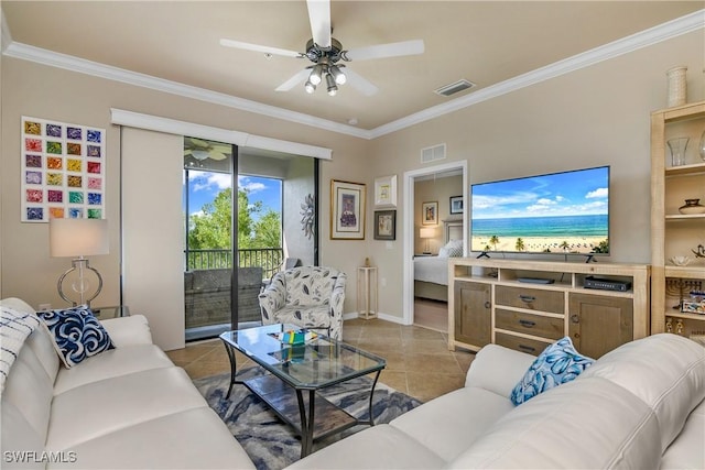 tiled living room with ceiling fan and ornamental molding