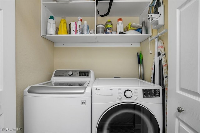 laundry area with washer and dryer