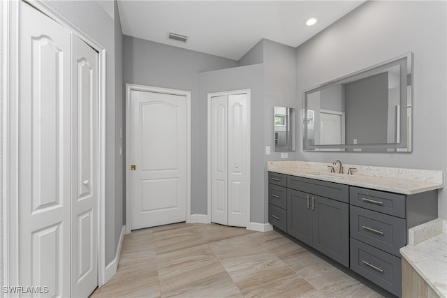 bathroom with vanity and tile patterned floors