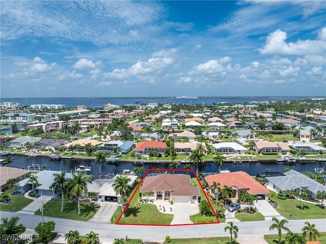 drone / aerial view featuring a water view