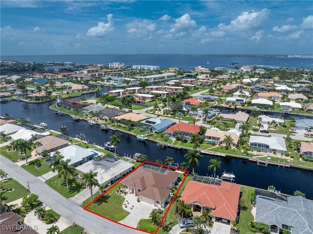 bird's eye view with a water view