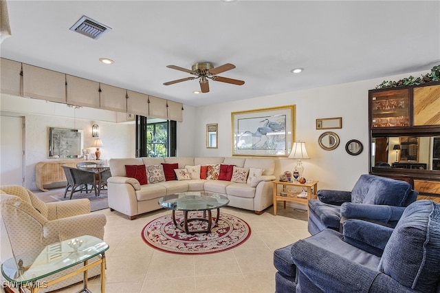 living room with ceiling fan and light tile patterned flooring