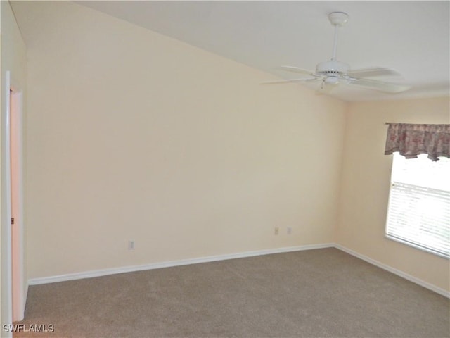 unfurnished room featuring carpet floors and ceiling fan