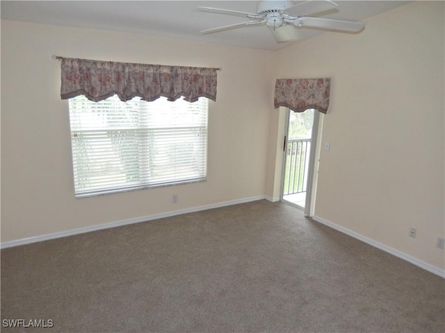 carpeted empty room with ceiling fan