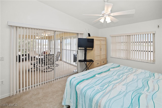 bedroom featuring vaulted ceiling, carpet floors, and ceiling fan