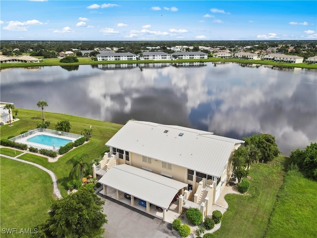 drone / aerial view featuring a water view