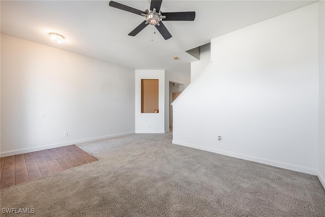 carpeted empty room with ceiling fan