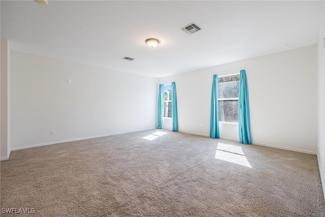 view of carpeted spare room