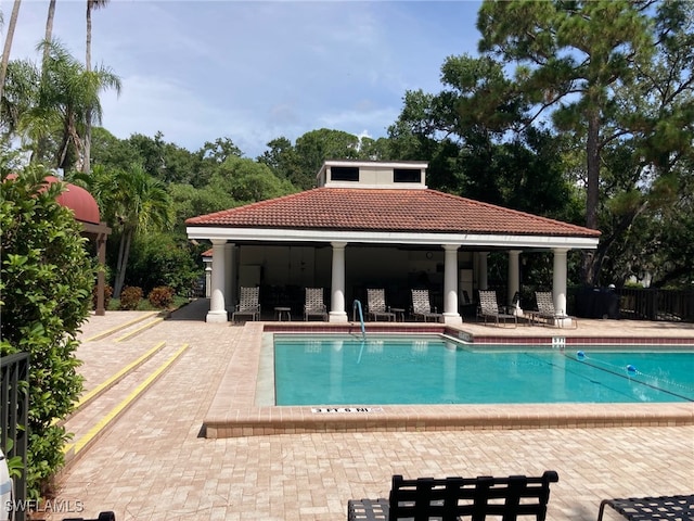 view of pool with a patio