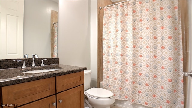 full bathroom with vanity, toilet, and shower / bath combo with shower curtain