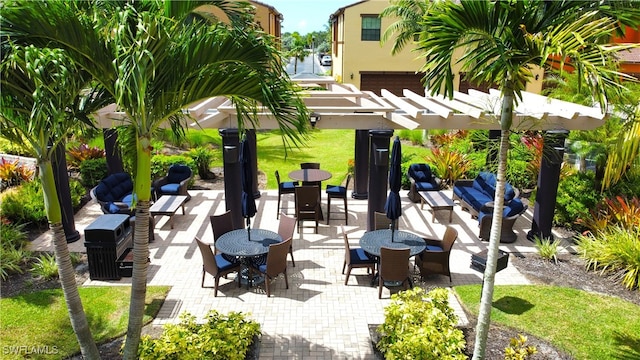 view of patio / terrace with outdoor lounge area and a pergola