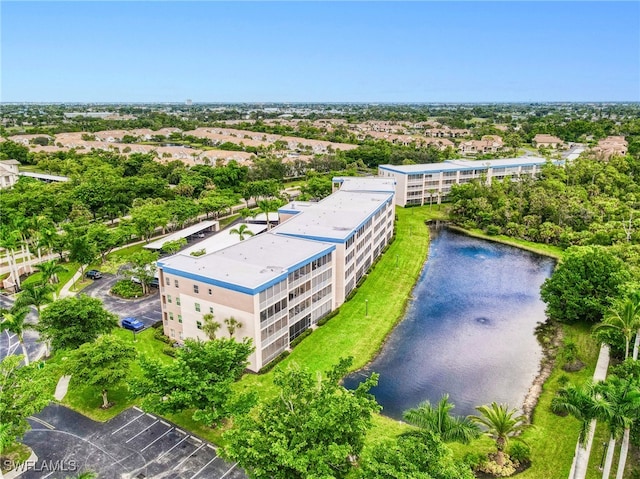 drone / aerial view with a water view