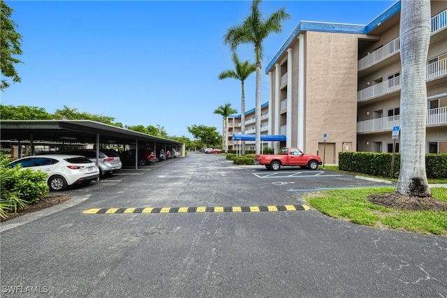 view of car parking featuring a carport