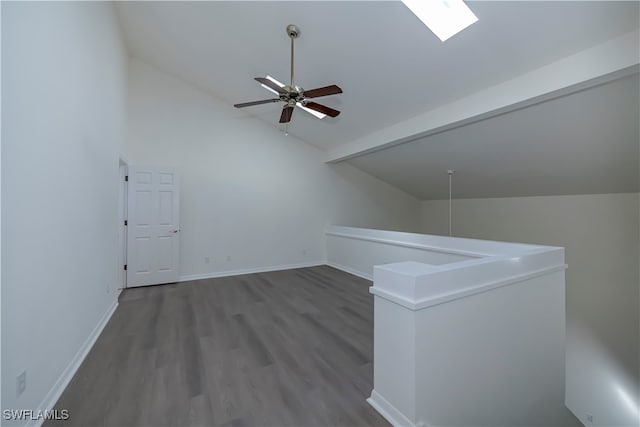 bonus room with high vaulted ceiling, ceiling fan, baseboards, and wood finished floors