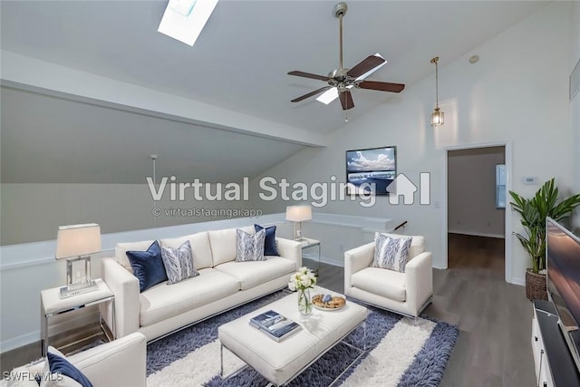 living room featuring ceiling fan, dark wood-type flooring, and vaulted ceiling with skylight