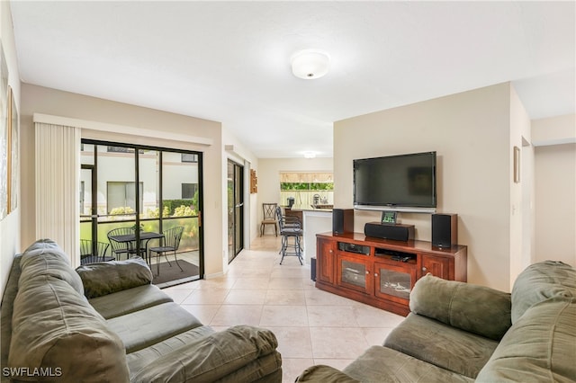 tiled living room featuring lofted ceiling