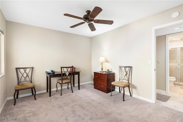 sitting room featuring ceiling fan and light colored carpet